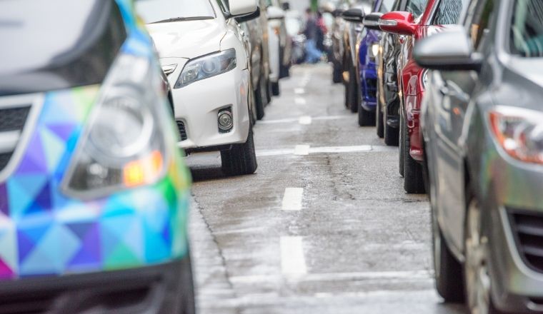 A close up of vehicles in traffic