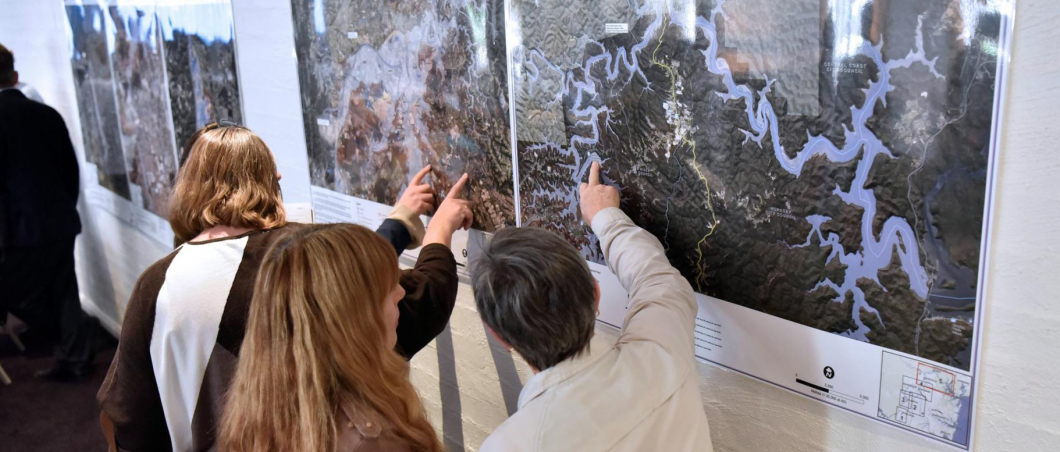 People pointing at a Hawkesbury-Nepean valley map