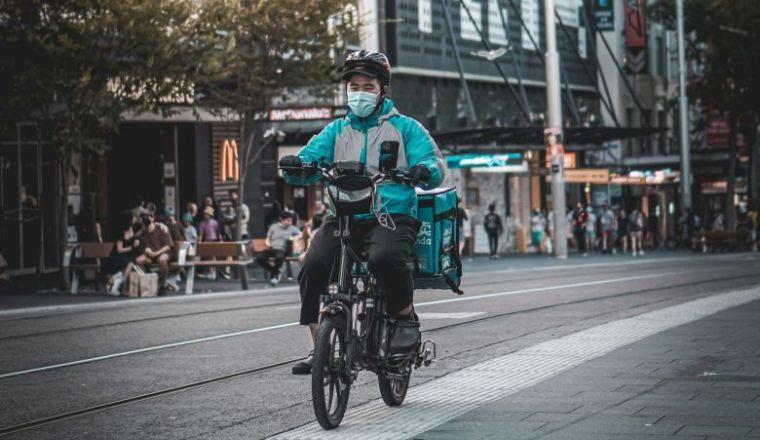 Food delivery man on bike