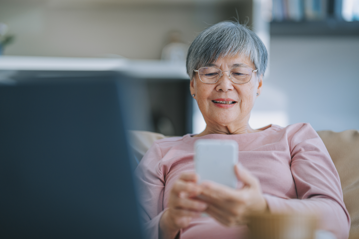 Older woman looking at mobile phone