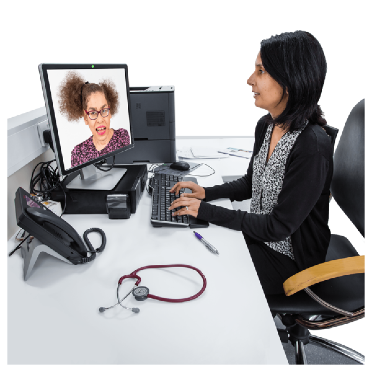 woman on laptop video call with another woman