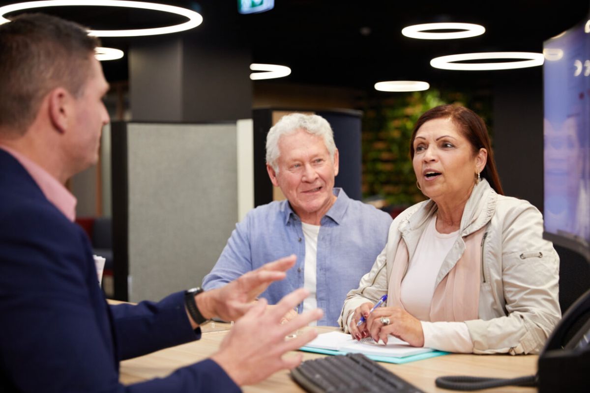 A senior couple seeking advice at a Service NSW Centre