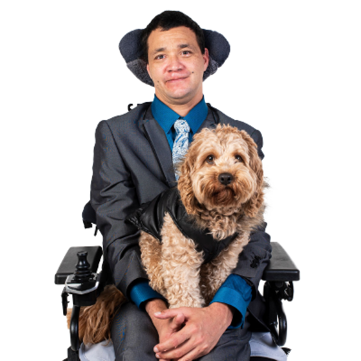 A man in a wheelchair with his support animal.