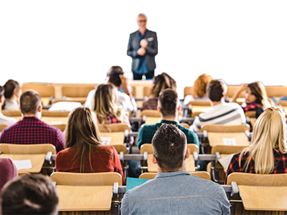 A classroom with a teacher and adult students