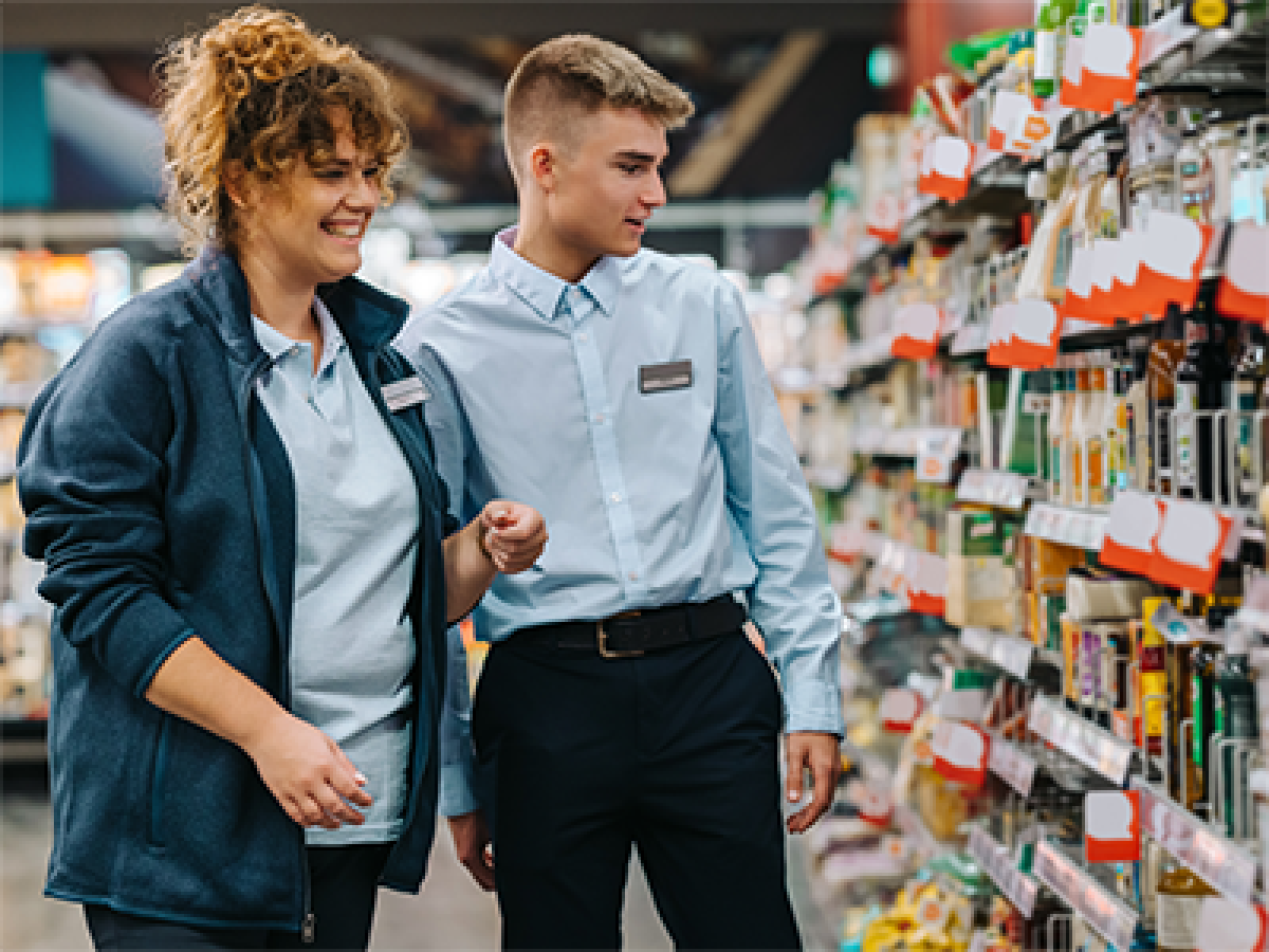 Staff showing new worker workplace