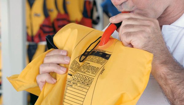 Lifejacket user inflating lifejacket