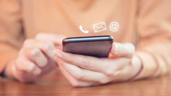 Hand of woman holding mobile smartphone