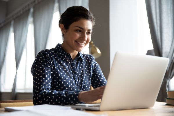 Female student studying laptop