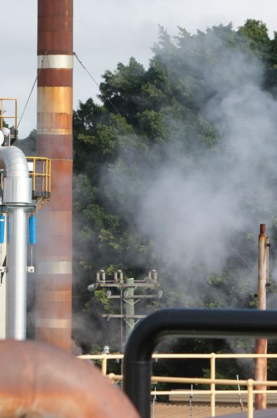 Smoke rises from an industrial facility