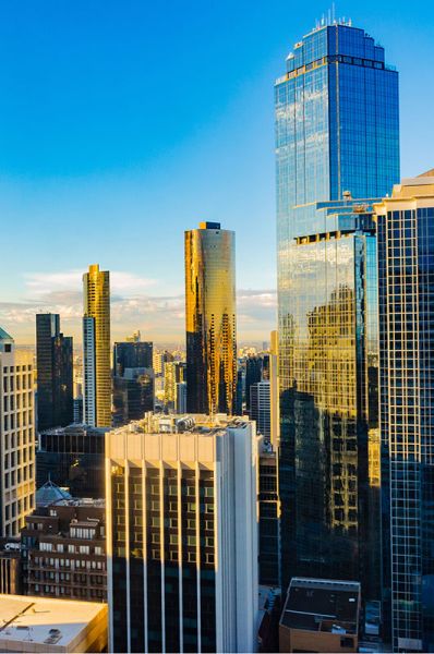 City buildings reflecting sunlight