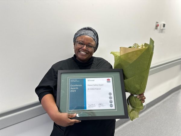 Dr Vimbai Kapuya with her award