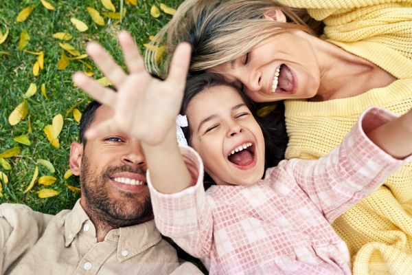 voverhead view of a happy family spending time together in the park