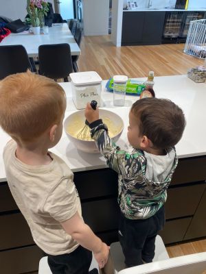 Two early stage 1 children in home schooling cooking class