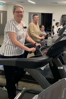 Breast cancer survivor group exercising on treadmills