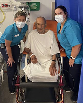 Two occupational therapists with a patient in the Emergency Department