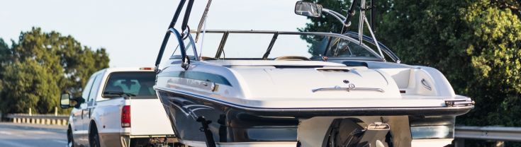 Boat being driven on a trailer