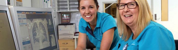 Two Allied Health workers smiling