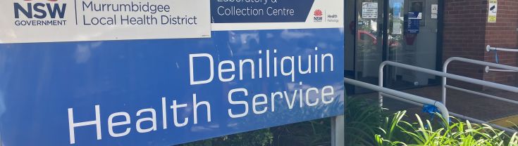 Main entry to the Deniliquin Health Service. A sign indicating the main entrance also highlights the service's pathology lab and collection centre. 