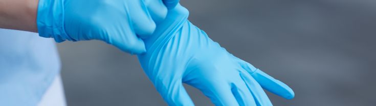 Surgical gloves being removed 