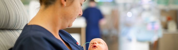 Nurse with newborn baby