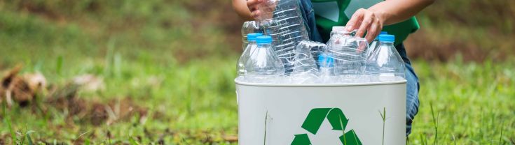 A young person recycling plastics 