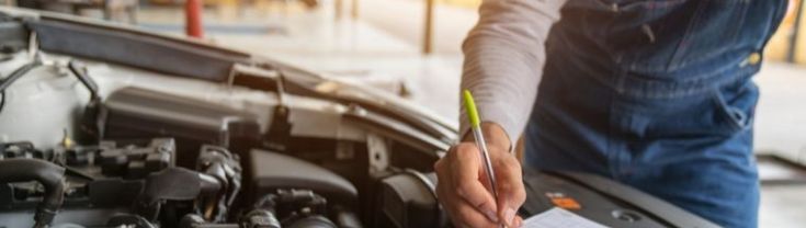 Mechanic with clipboard