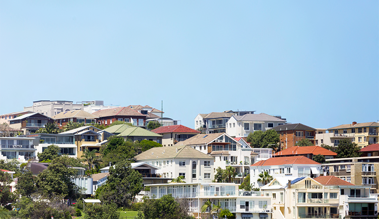 Houses and apartments with some trees to the left