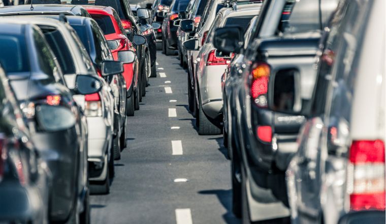 Two lanes of cars stuck in traffic