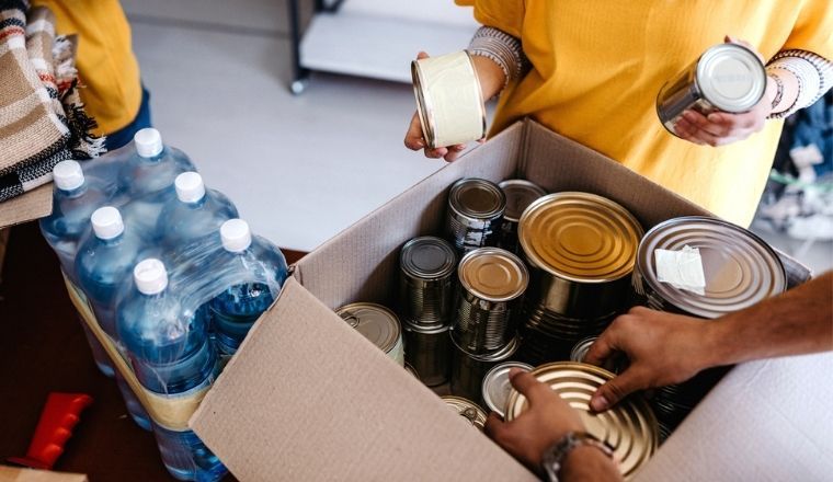 Charity workers packing food supplies