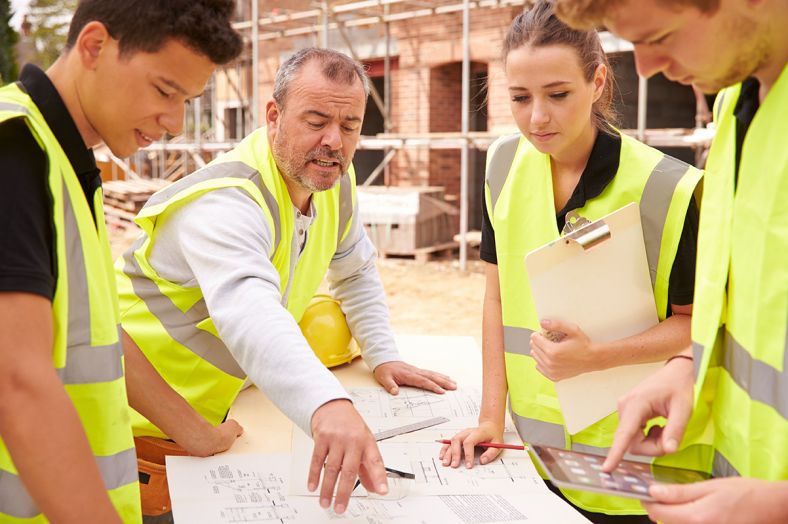 construction apprentices on the job