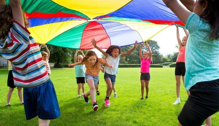 A group of children playing in a park.