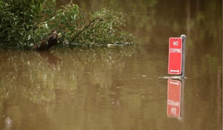 Flooded area with no stopping sign