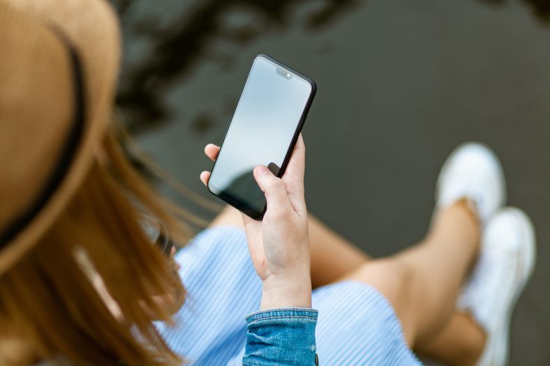 Woman holding smartphone