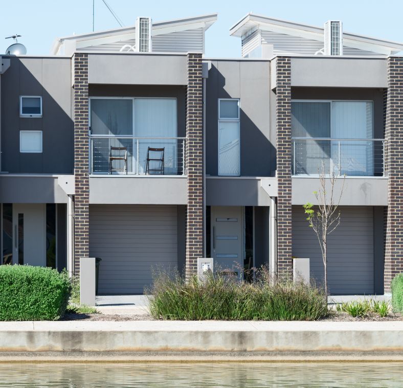 Two townhouses that mirror the same design. 