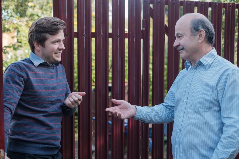 Image of two neighbours having a discussion