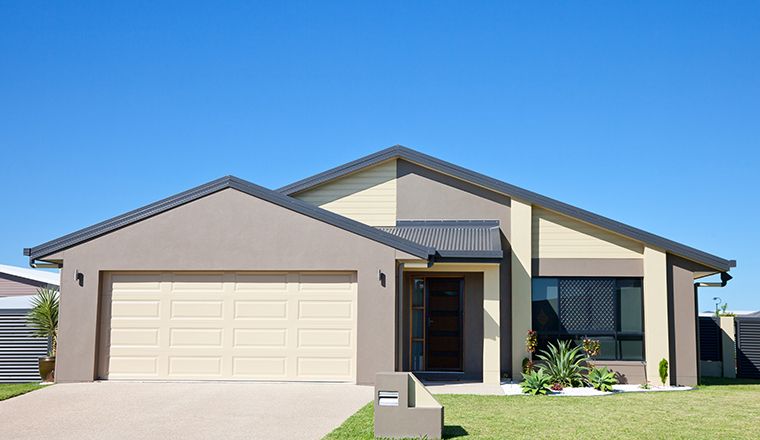 Image of house with framed against a blue sky