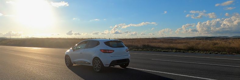 Car driving along rural road