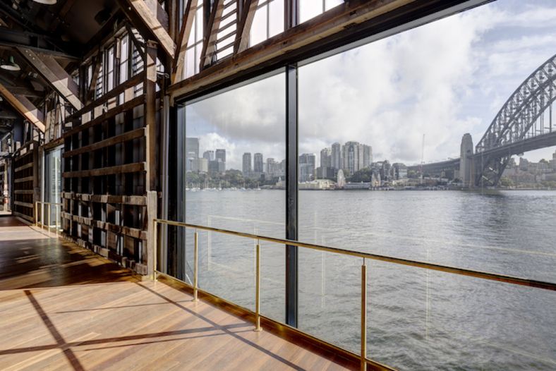 View from inside Walsh Bay to Sydney Harbour and bridge