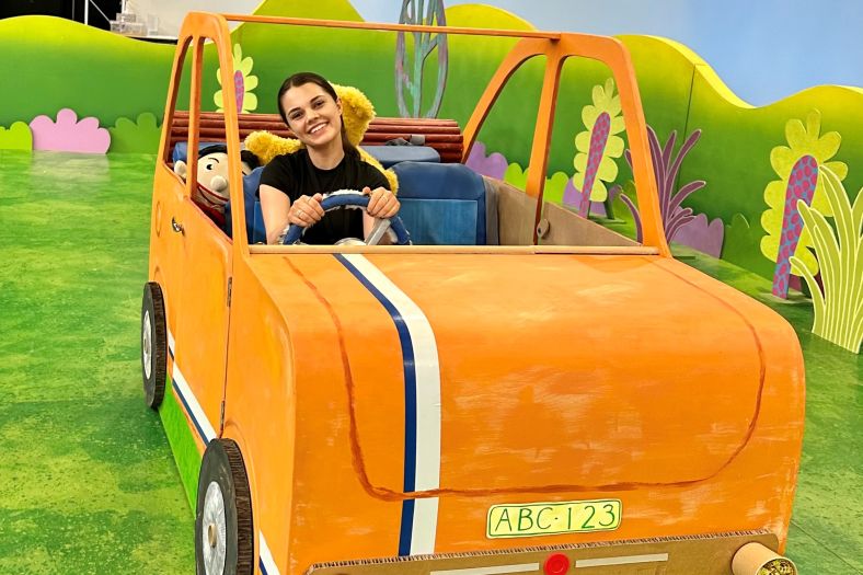 Driving the Playschool car on ABC set