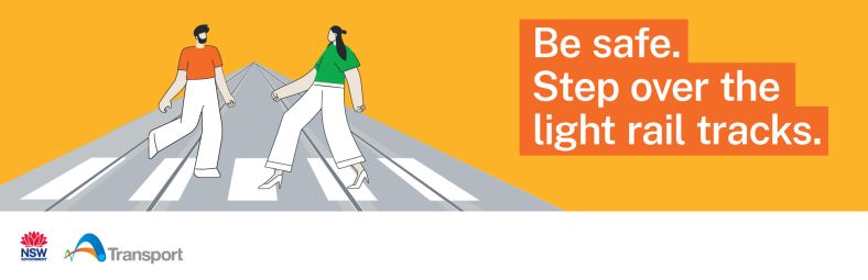 Light rail safety campaign with the message: Be safe. Step over the light rail tracks.