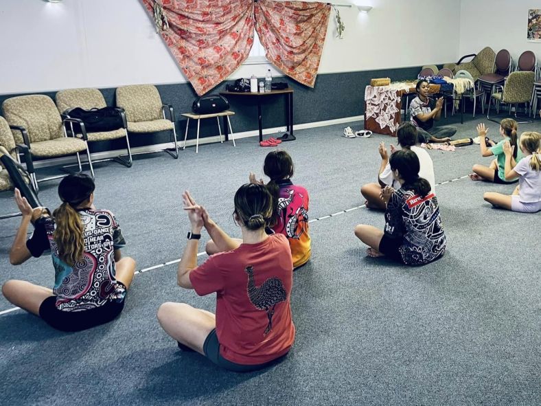 dance workshop participants seated