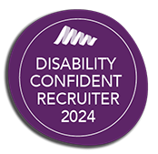 A white triangle squiggle and the words Disability Confident Recruiter 2023 sit on top a purple circle with a white ring around it