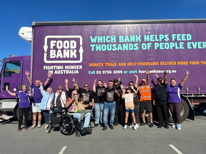 Group of community, volunteers and staff at Moruya fresh food pop-up event