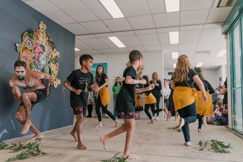 Young Aboriginal performers dance at the Saltwater Freshwater Art Gallery