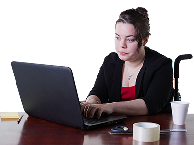 A person sitting at a laptop researching.