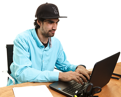 A man at a computer viewing how to apply to TAFE