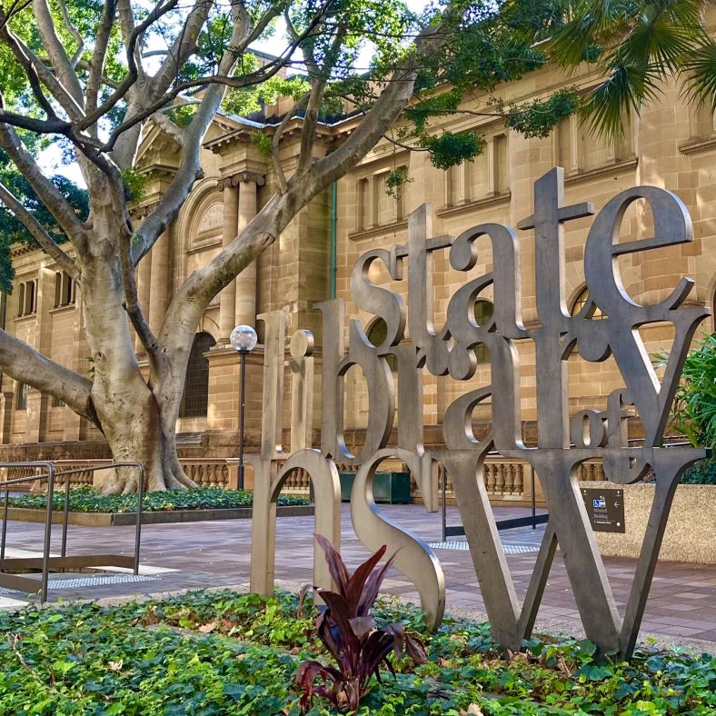 The NSW State Library metal scuplture sign outside the library itself
