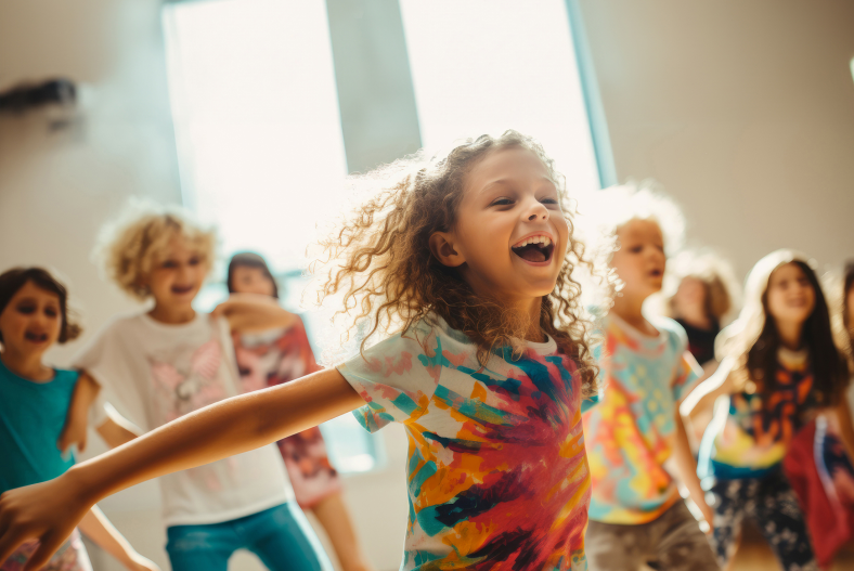 A young girl in a class with other children playing.