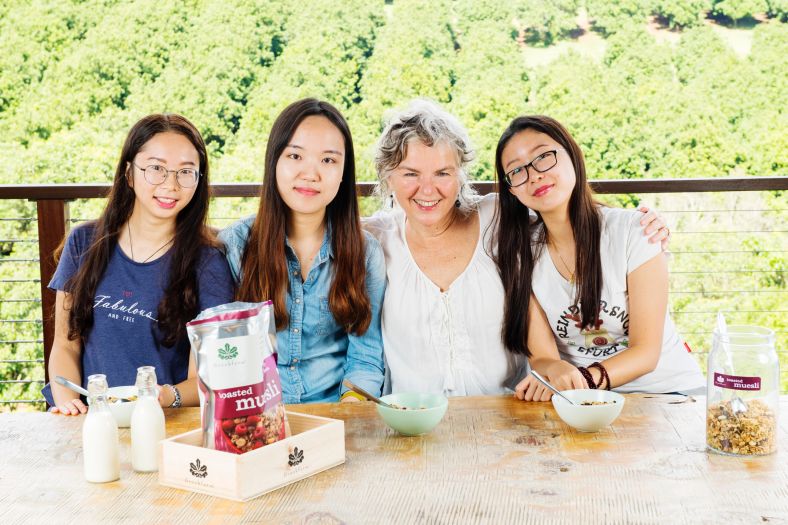 A group of 4 Chinese students sampling Brookfarm products & services