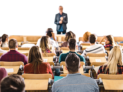 A classroom with a teacher and adult students